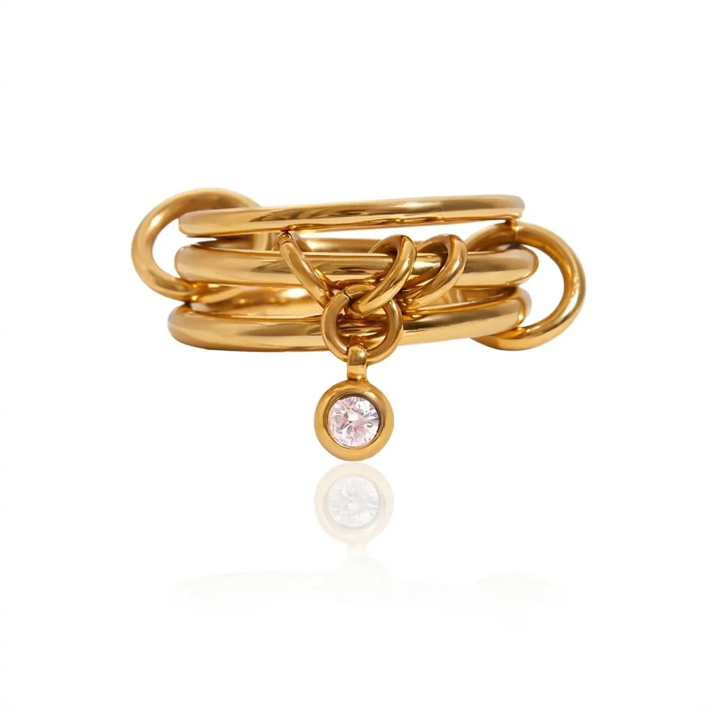 Odile gold triple interlocked band ring with a drop charm