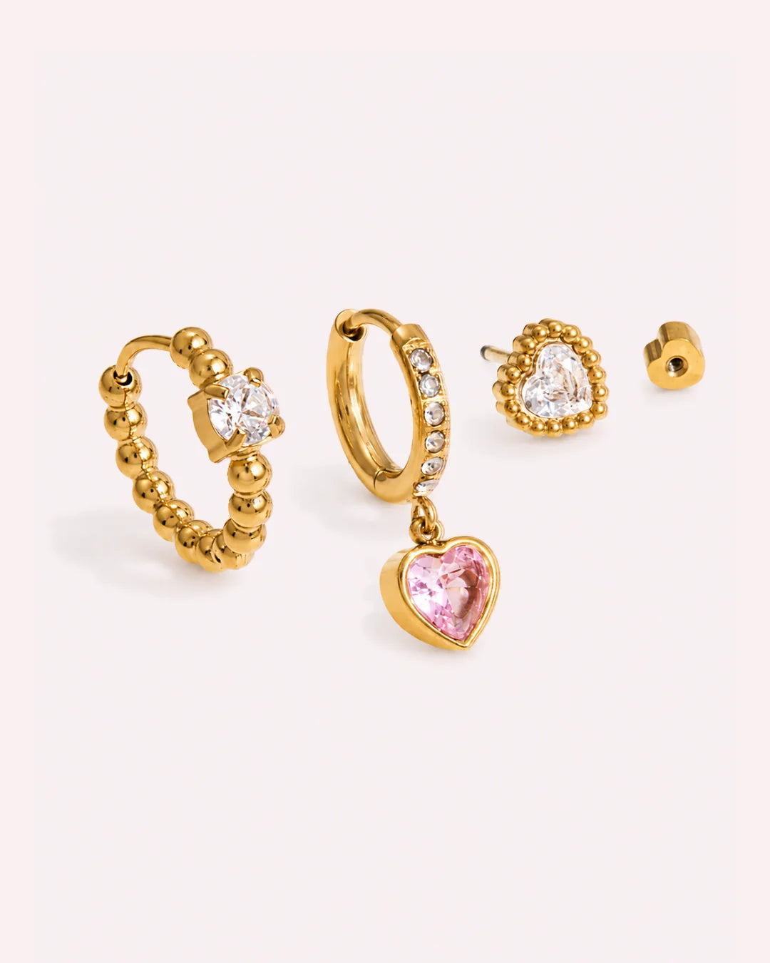 Delilah gold heart earring set with beaded hoop, pink heart drop huggie and heart stud