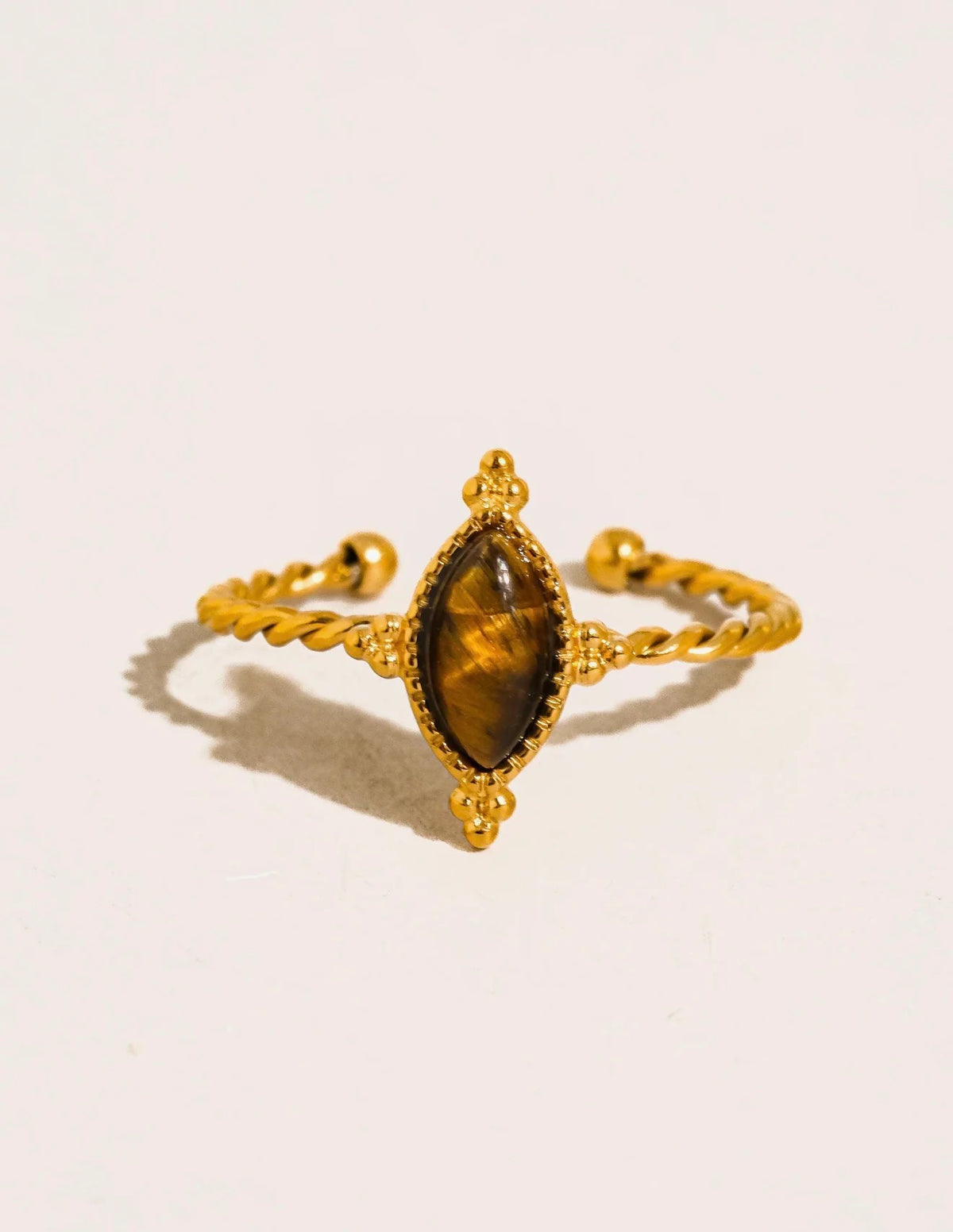 Zoe twisted gold ring with a brown marquise stone, view 3