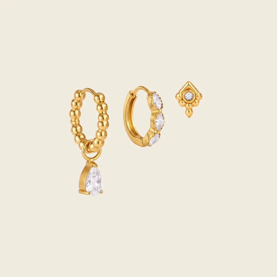 Maisie three piece gold earring set with beaded hoop and pear drop, marquise huggie and mini stud, view 3