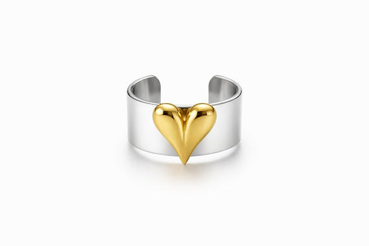 Amara wide silver band ring with a gold heart