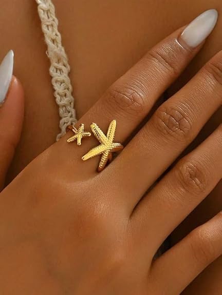 Stella gold open ring with a large textured starfish, view 3
