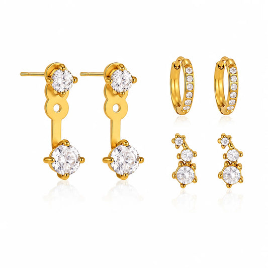 Gabrielle three piece gold earring set with crystal ear jacket, pave huggie and crystal cluster drop