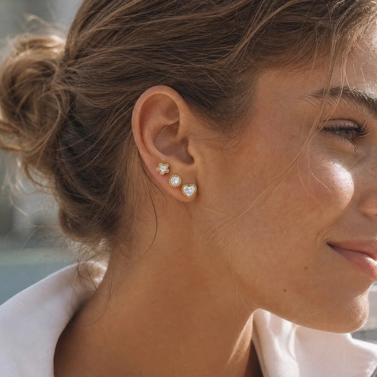 Millie gold stud earring set with heart, round and star crystals in beaded bezels, view 3