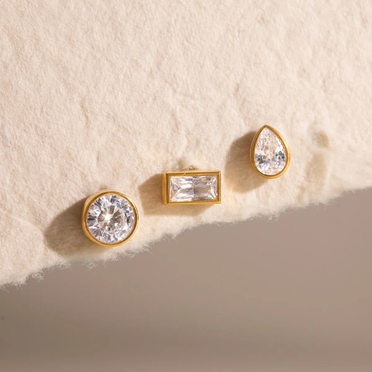 Harlow gold stud earring set with baguette, pear and round crystals, view 6