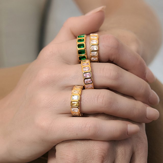 Pippa gold eternity band with pink emerald cut stones, view 2