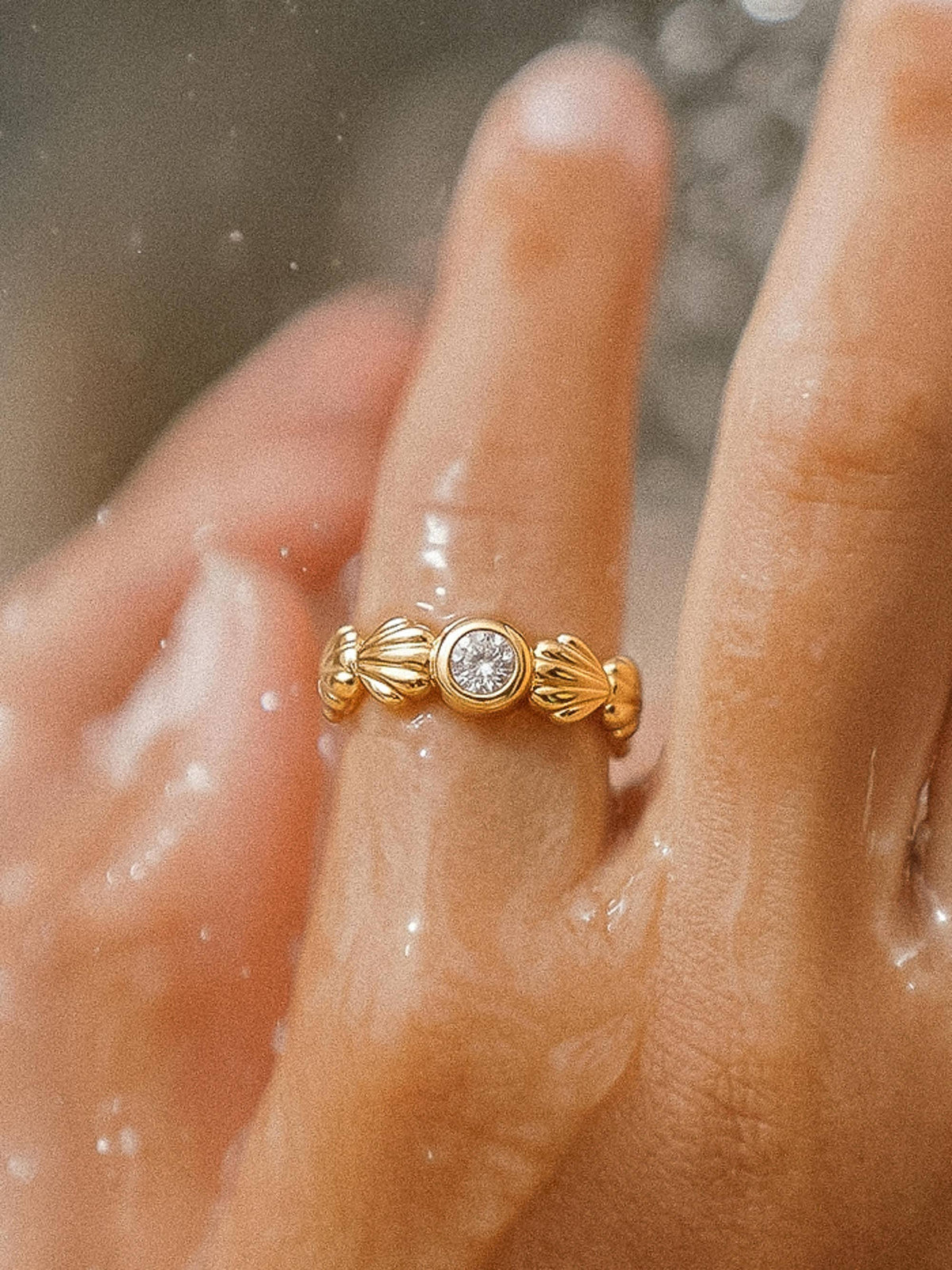 Marina gold scallop shell band ring with a centre stone, view 2