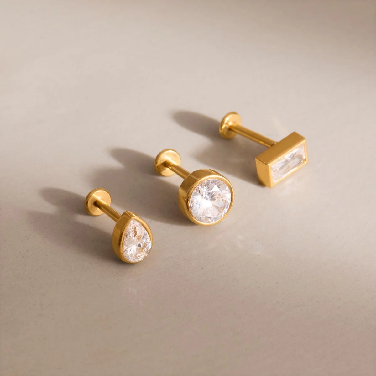 Harlow gold stud earring set with baguette, pear and round crystals, view 5