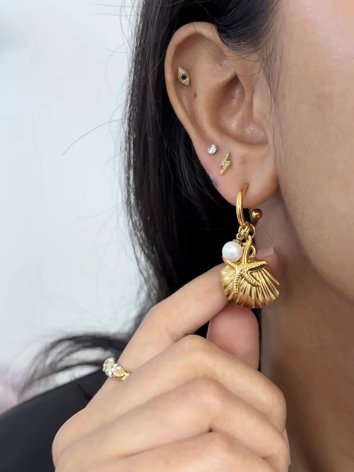 Marigold gold hoop earrings with shell, starfish and pearl charms, view 2