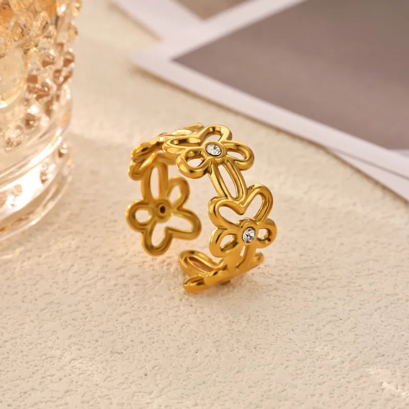 Daisy gold floral cut-out band ring with small stones, view 2