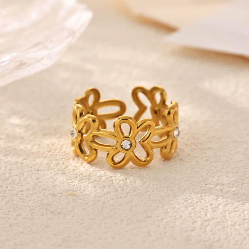 Daisy gold floral cut-out band ring with small stones, view 3