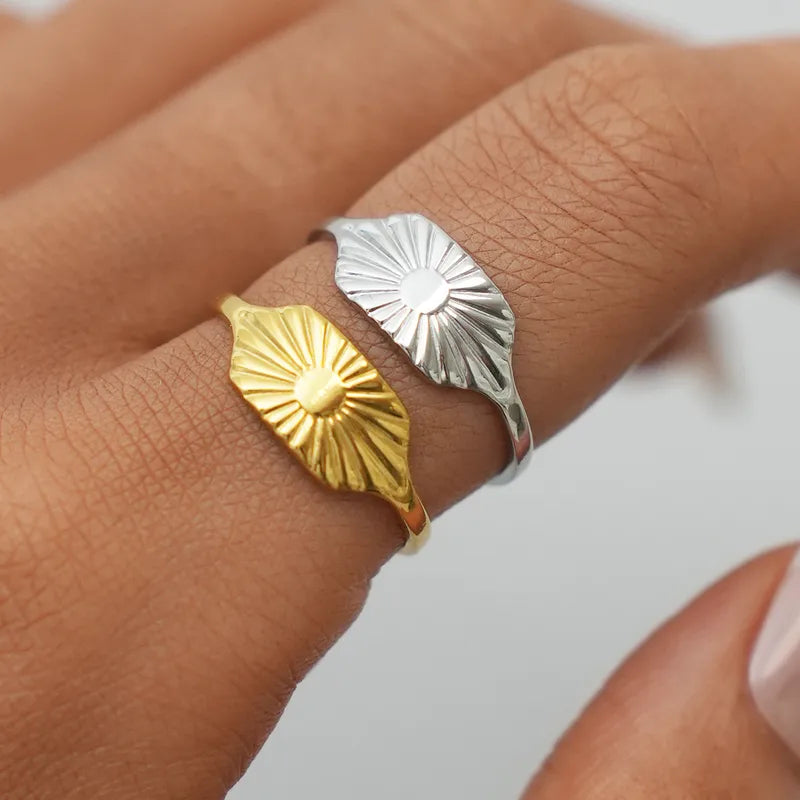 Helena gold signet ring with an engraved sunburst, view 2