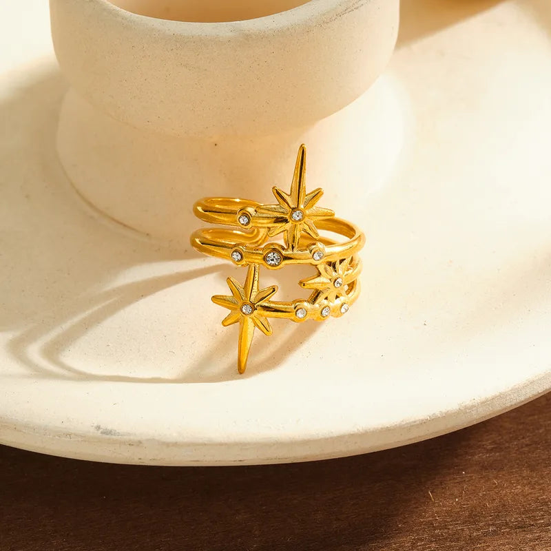 Astra gold layered wrap ring with starburst points, view 2