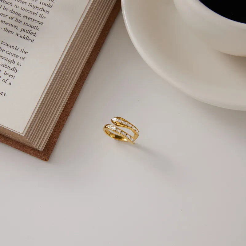 Elena gold double wrap ring with baguette cut clear stones, view 5