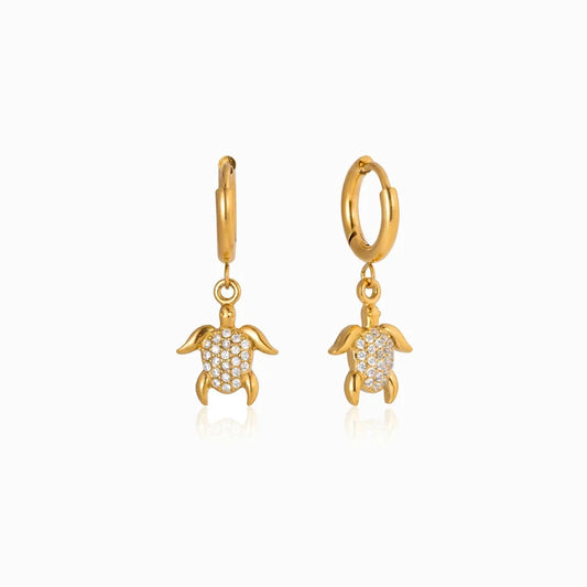 Hattie gold huggie earrings with crystal turtle charm