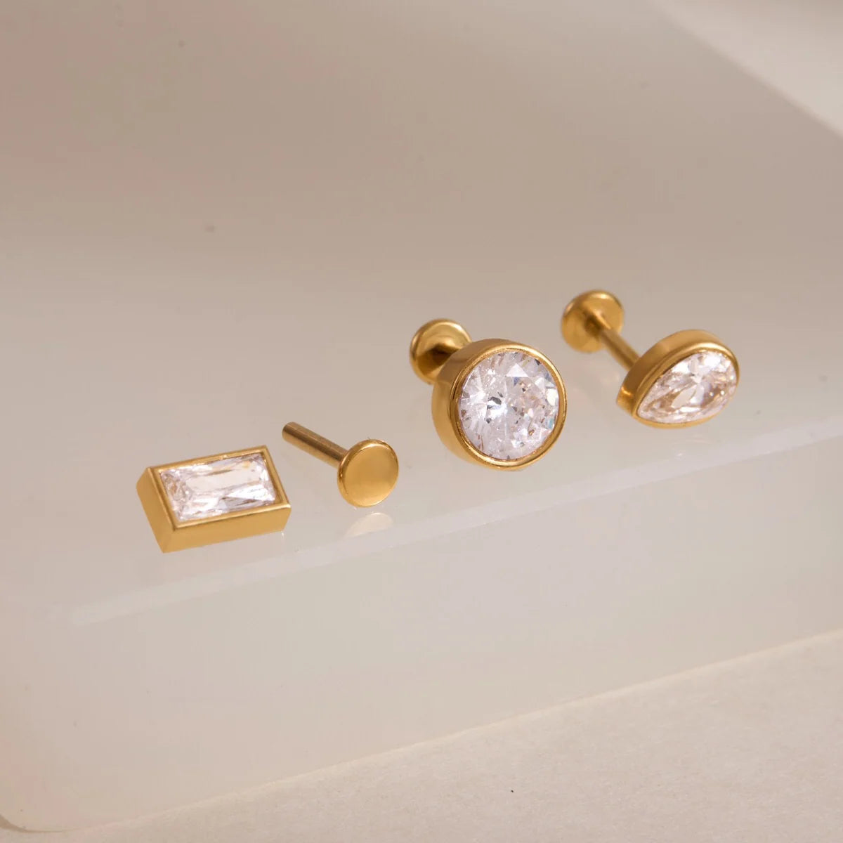 Harlow gold stud earring set with baguette, pear and round crystals, view 7
