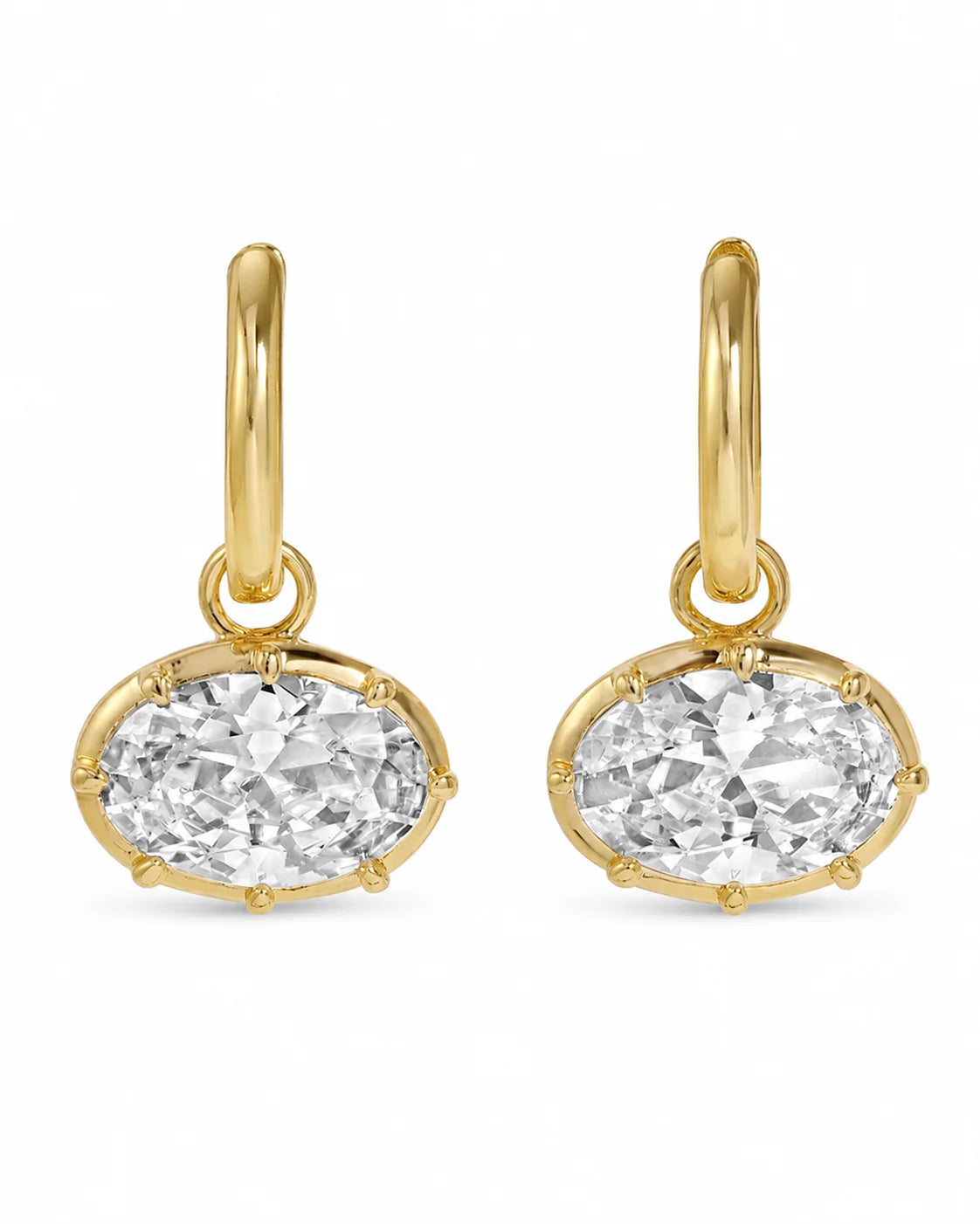 Genevieve gold huggie earrings with large oval crystal drop