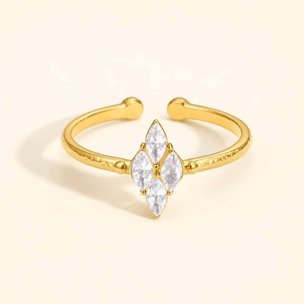 Caroline gold open ring with a diamond shaped marquise stone cluster