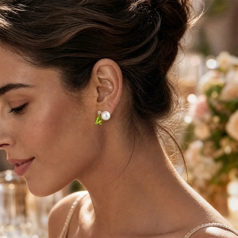 Margot gold stud earrings with a green pear stone, pearl and crystal, view 2