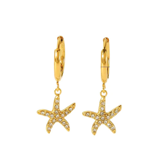 Sandy gold huggie earrings with crystal starfish charm