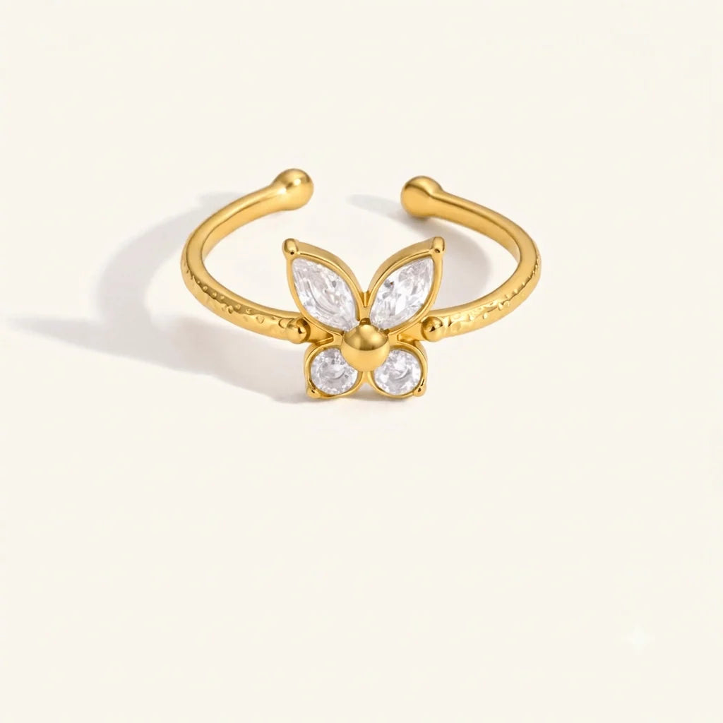 Vanessa gold open ring with a butterfly of marquise clear stones