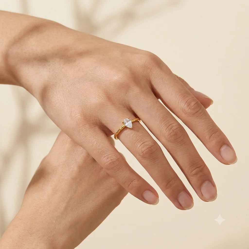 Natalie gold open ring with a pear cut solitaire stone, view 4