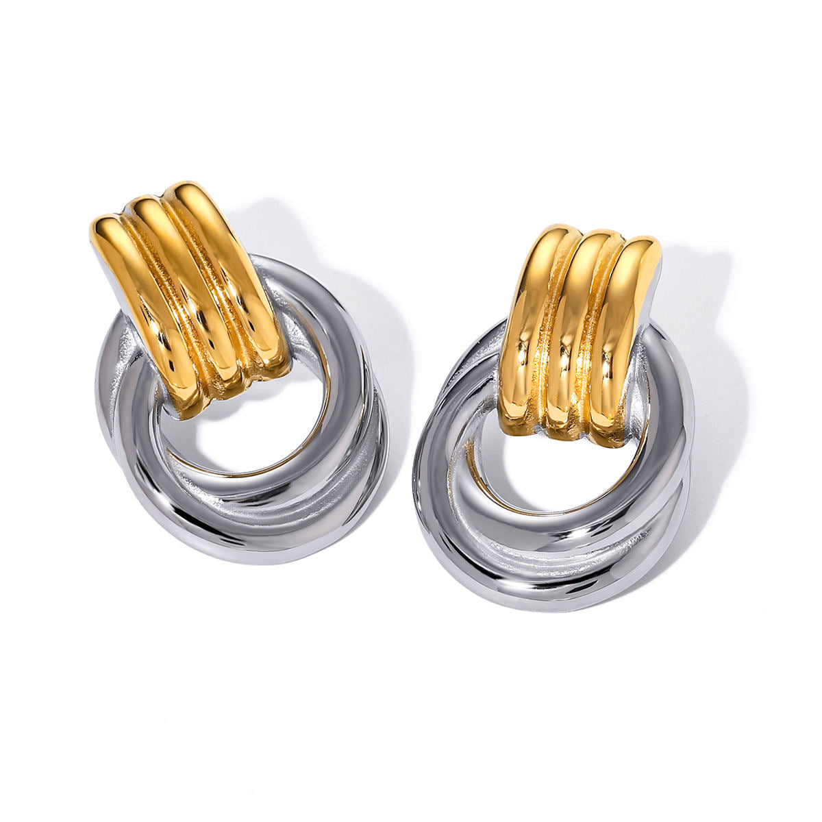 Allegra mixed metal ribbed knot door knocker earrings with silver tone loops