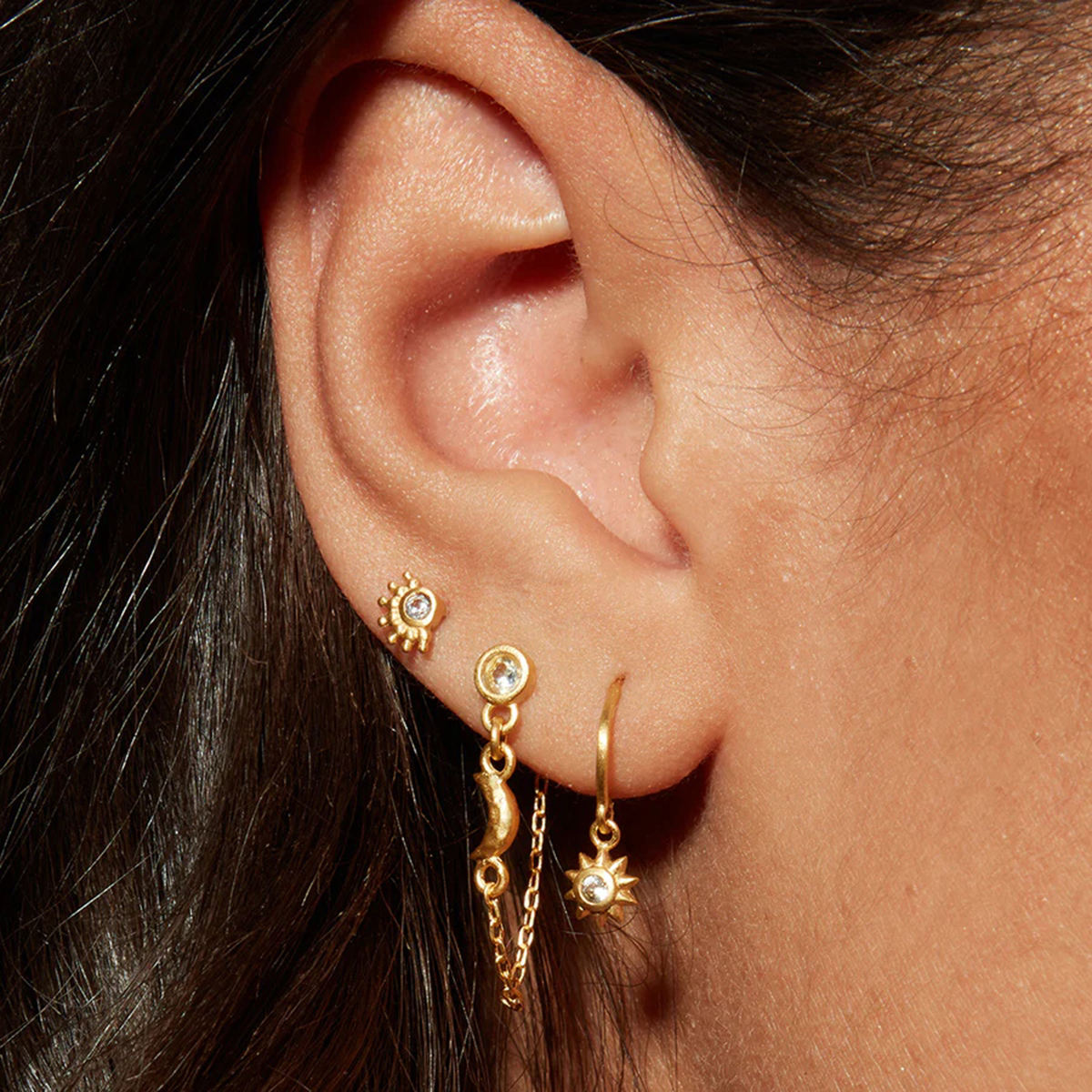 Lorna gold crystal stud earrings with moon and sun chain drops, view 2