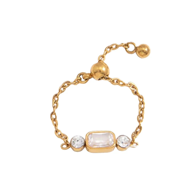 Chloe gold chain ring with a rectangle stone and two round stones