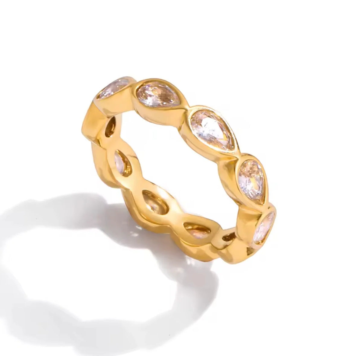 Amelie gold band with pink bezel-set stones