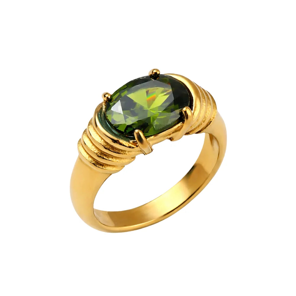 Molly ribbed gold ring with a green oval stone