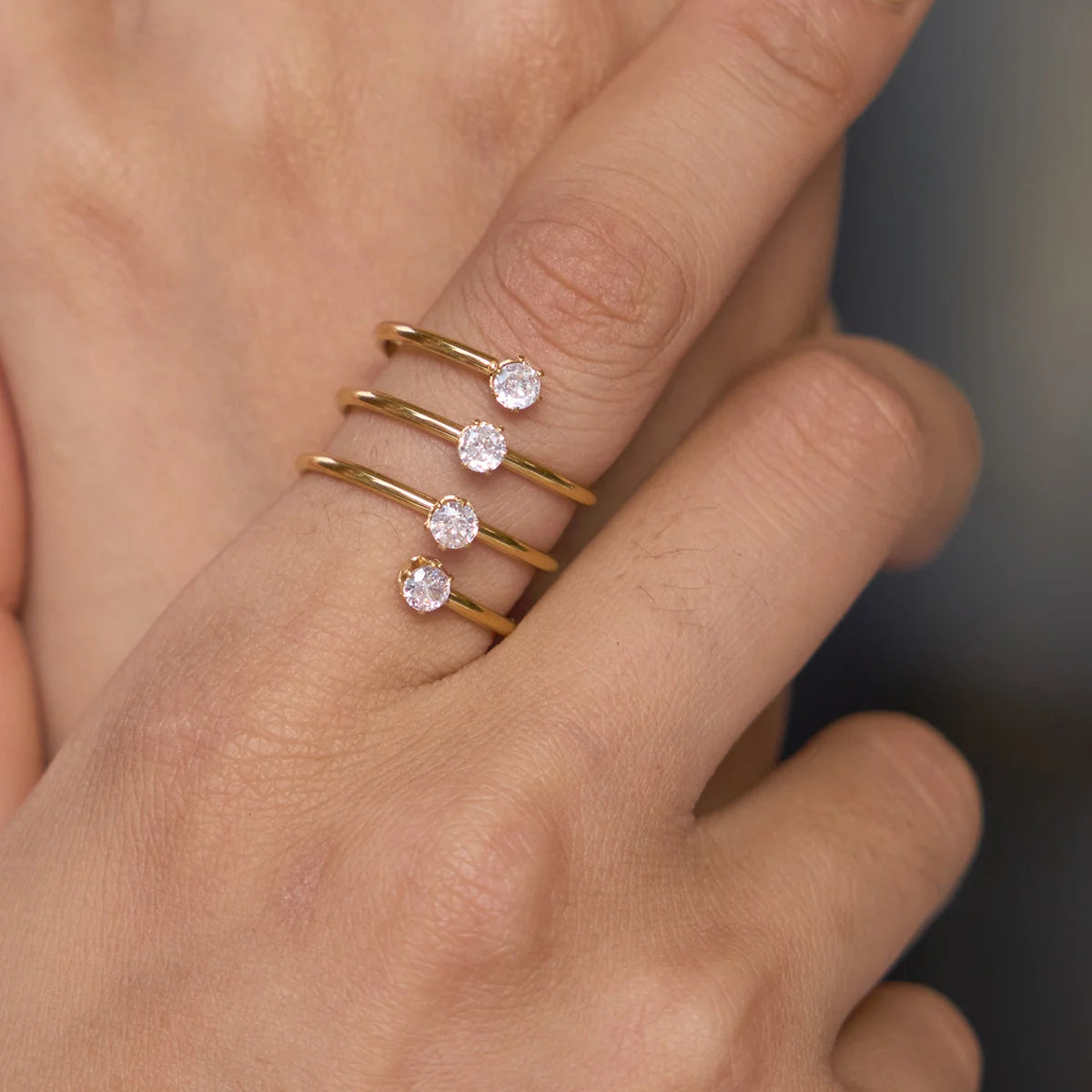 Sadie gold spiral coil ring with four round stones, view 5