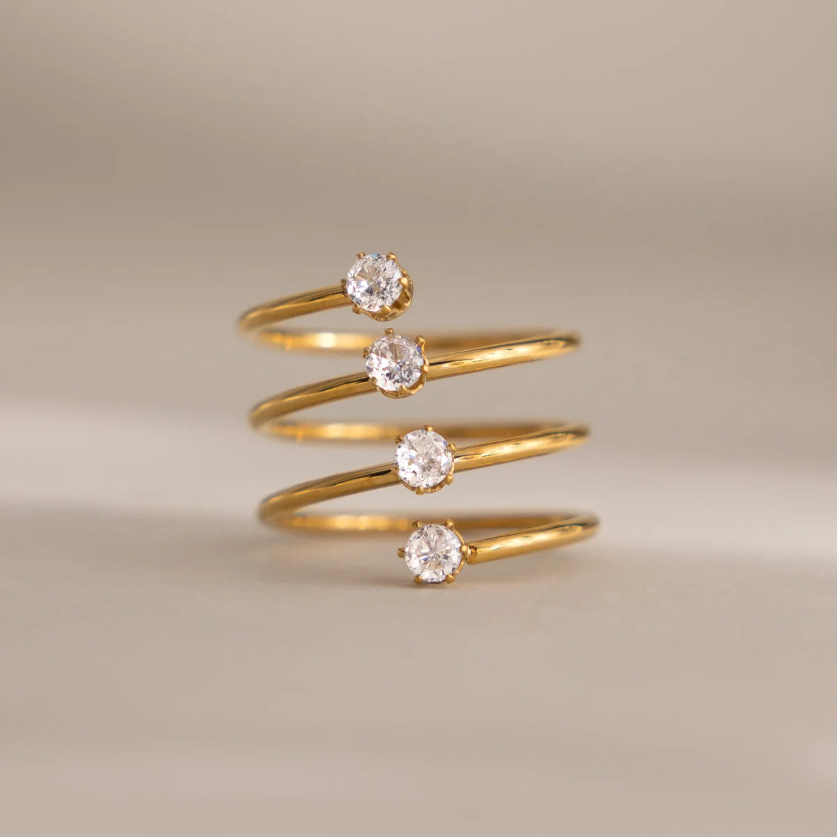 Sadie gold spiral coil ring with four round stones, view 3