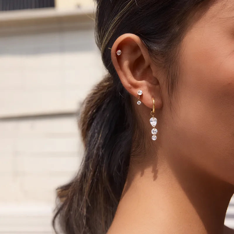 Daniela three piece gold earring set with crystal drop hoop, bezel drop and crystal stud, view 5