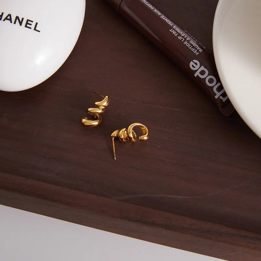 Sybil chunky gold swirl stud earrings