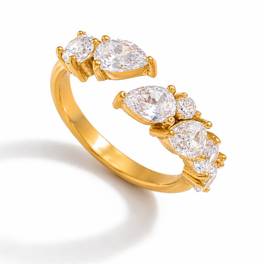 Arabella gold ring with graduated pear cut clear stones