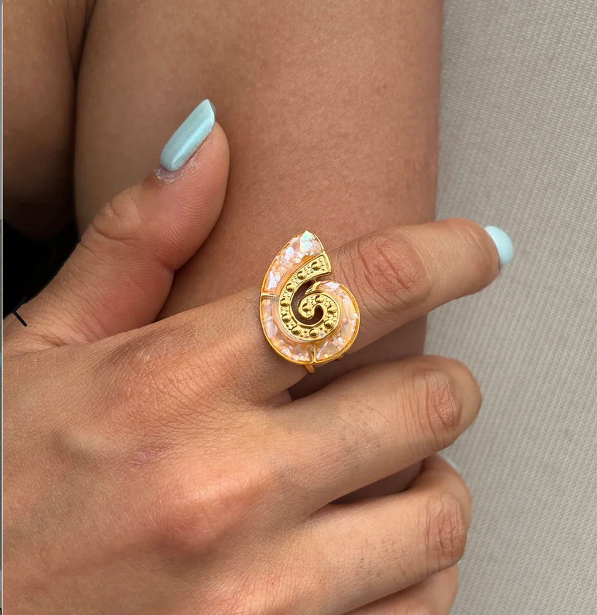 Oceane gold spiral seashell ring with peach enamel, view 3
