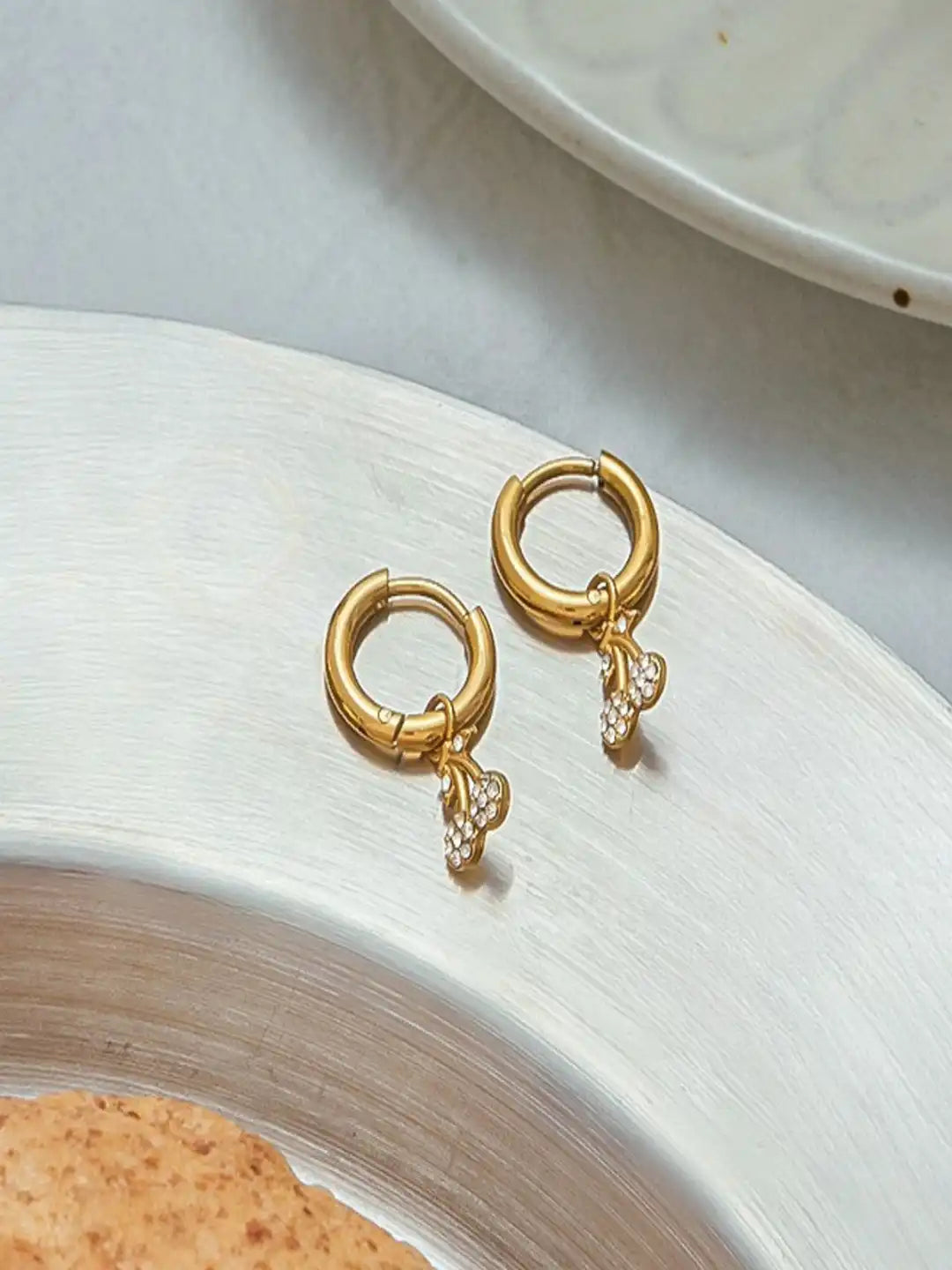 Posy gold huggie earrings with crystal cherry charm, view 3