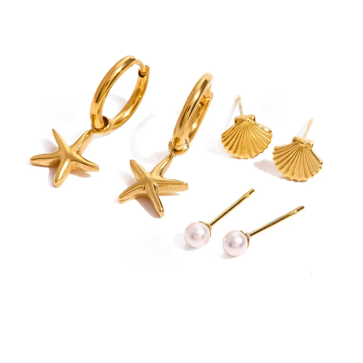 Melody gold earring set with starfish charm hoops, shell studs and pearl studs, view 2