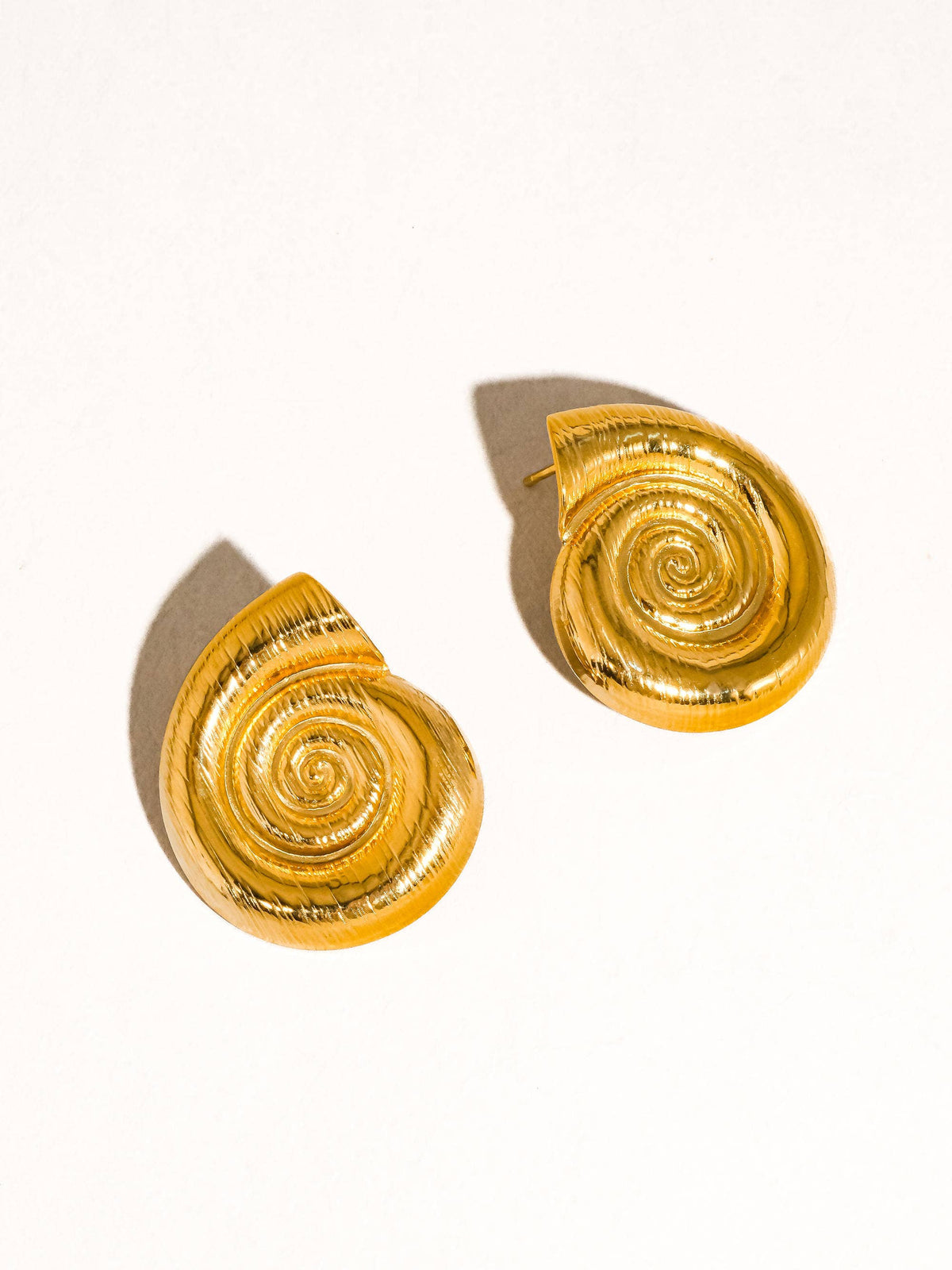Celia gold spiral seashell stud earrings, view 3
