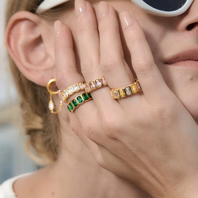 Pippa gold eternity band with pink emerald cut stones, view 3