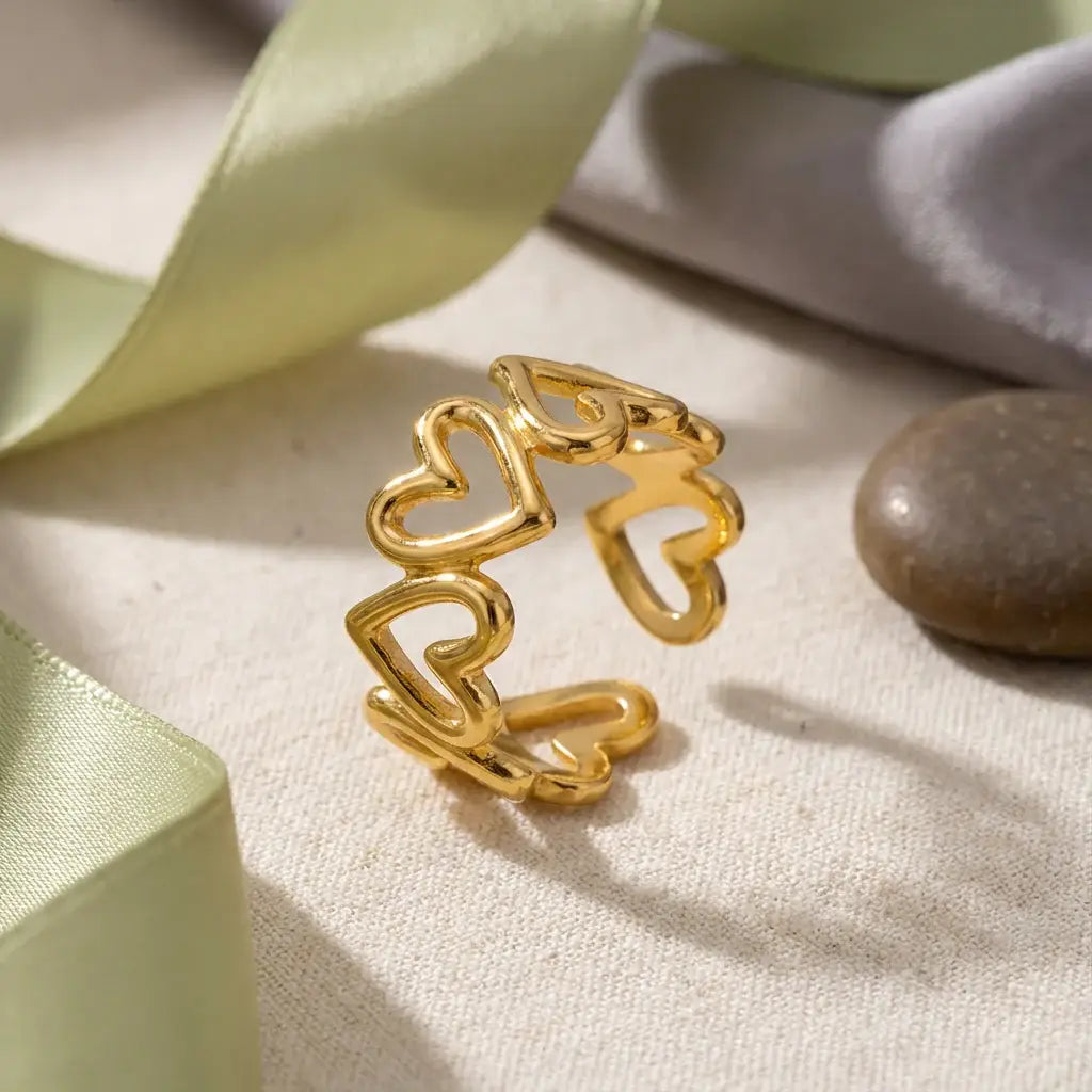 Mabel gold band ring with open cut-out hearts, view 3