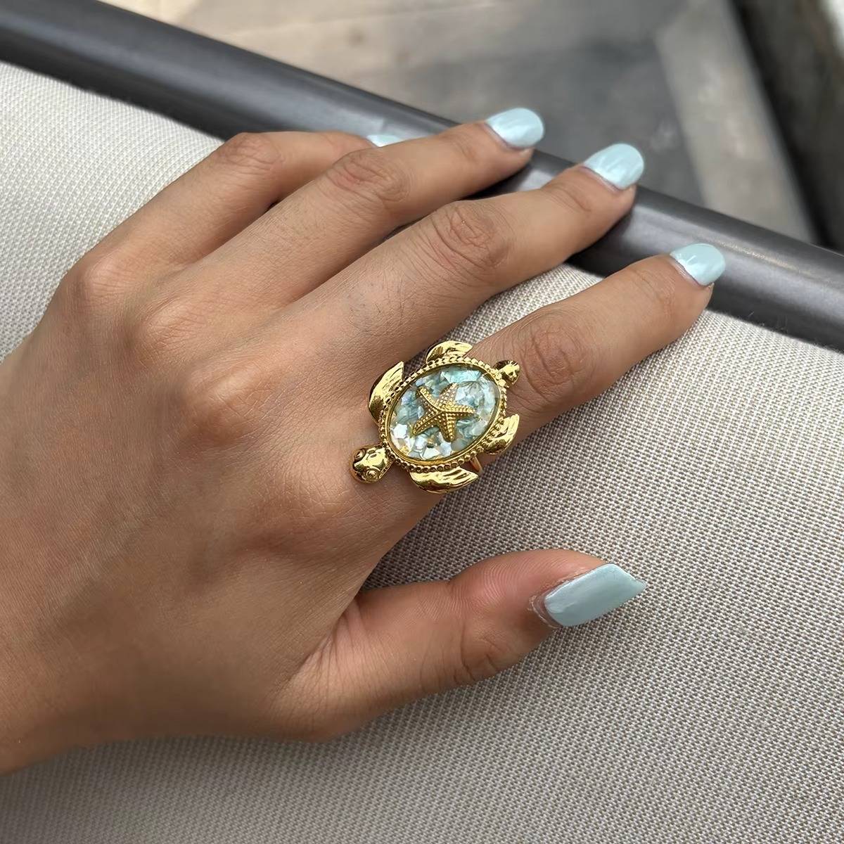 Kaia gold turtle ring with aqua enamel shell and starfish, view 3