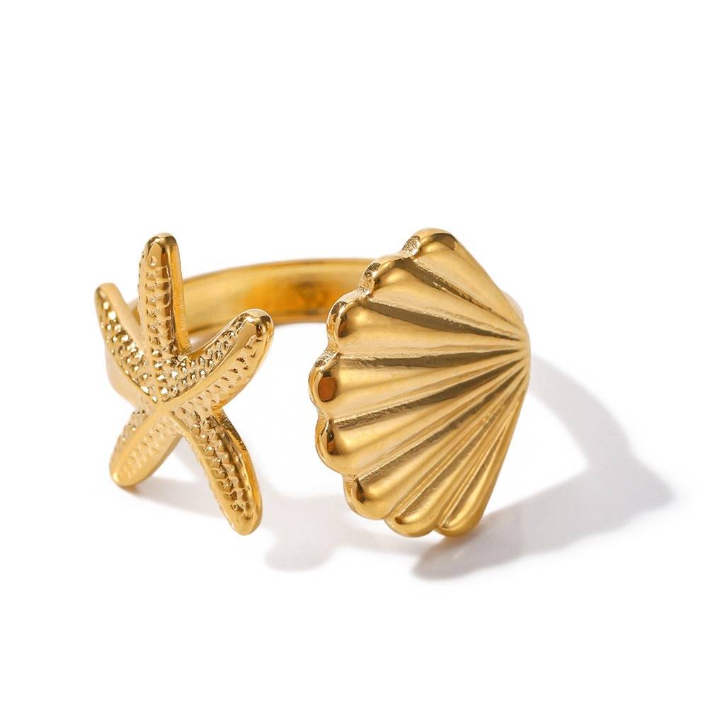 Ondine gold open ring with a starfish and a scallop shell