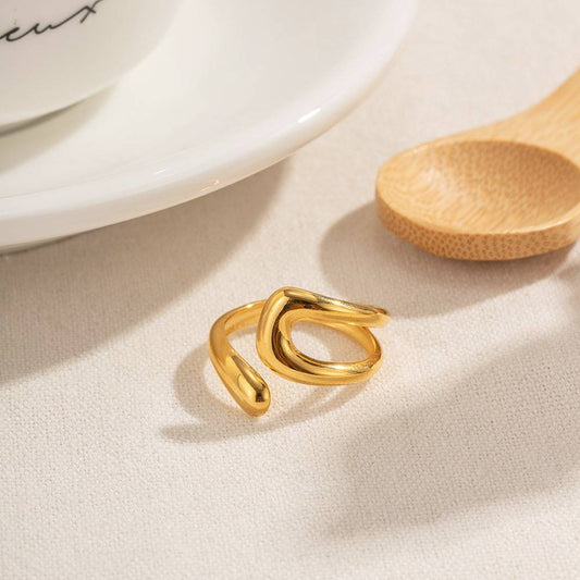 Greta sculpted gold looped knot ring