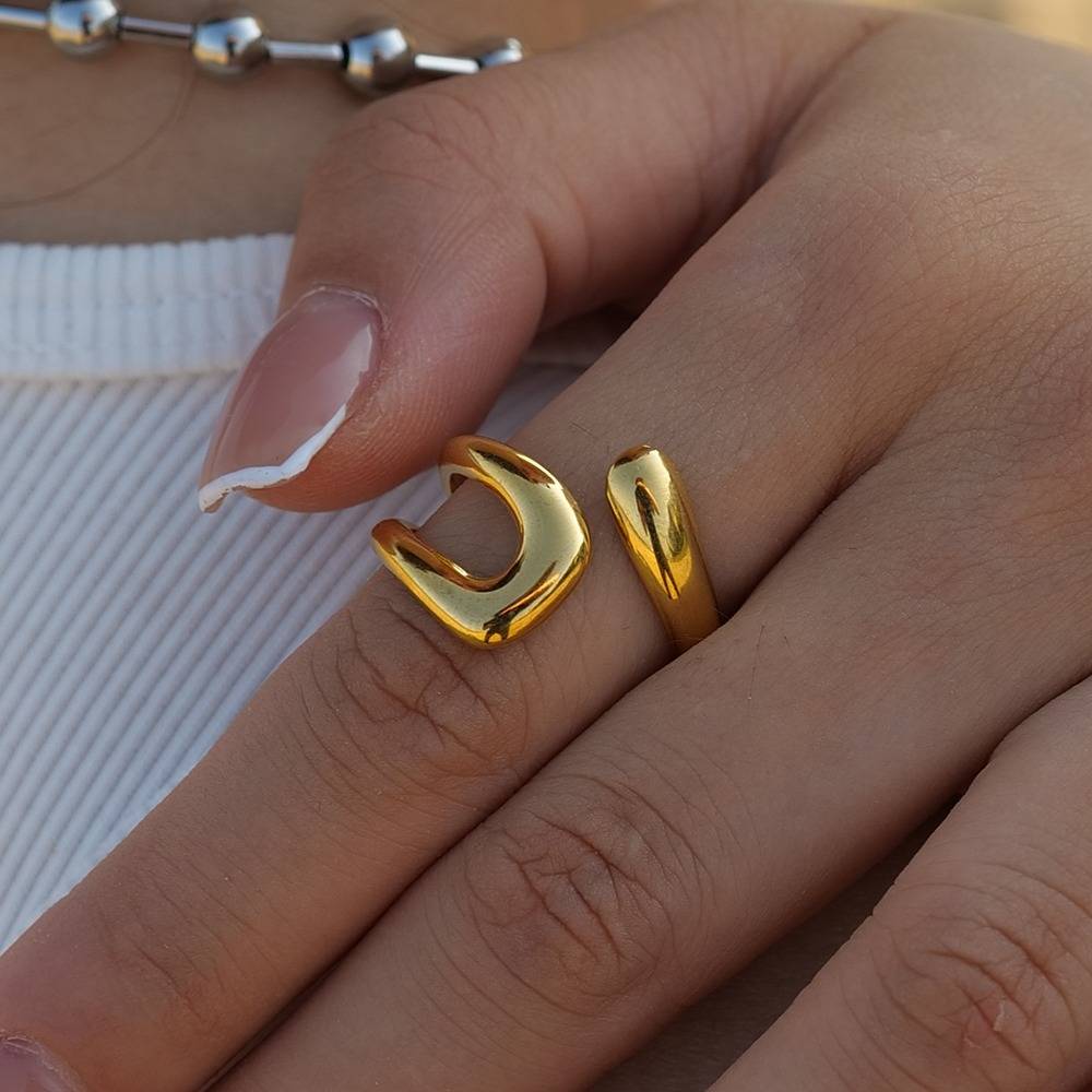 Greta sculpted gold looped knot ring, view 3