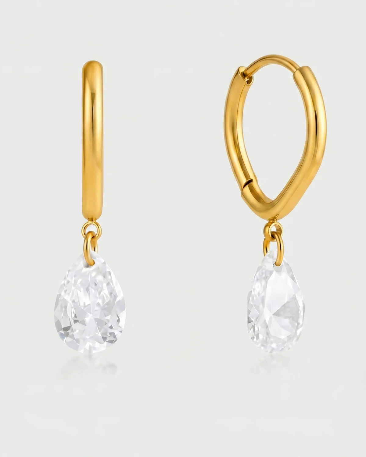 Lucy gold mini hoop earrings with pear crystal drop
