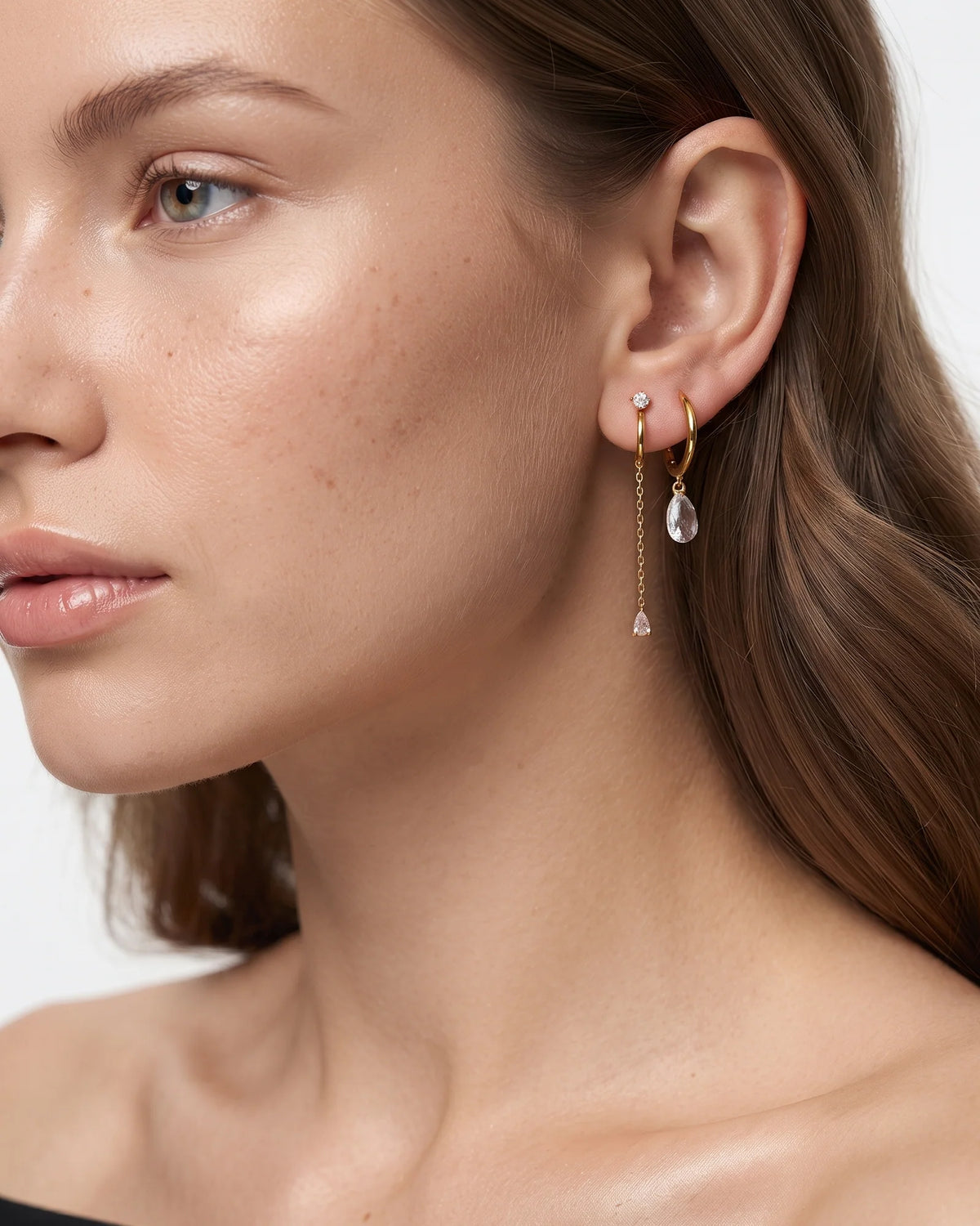 Lucy gold mini hoop earrings with pear crystal drop, view 2