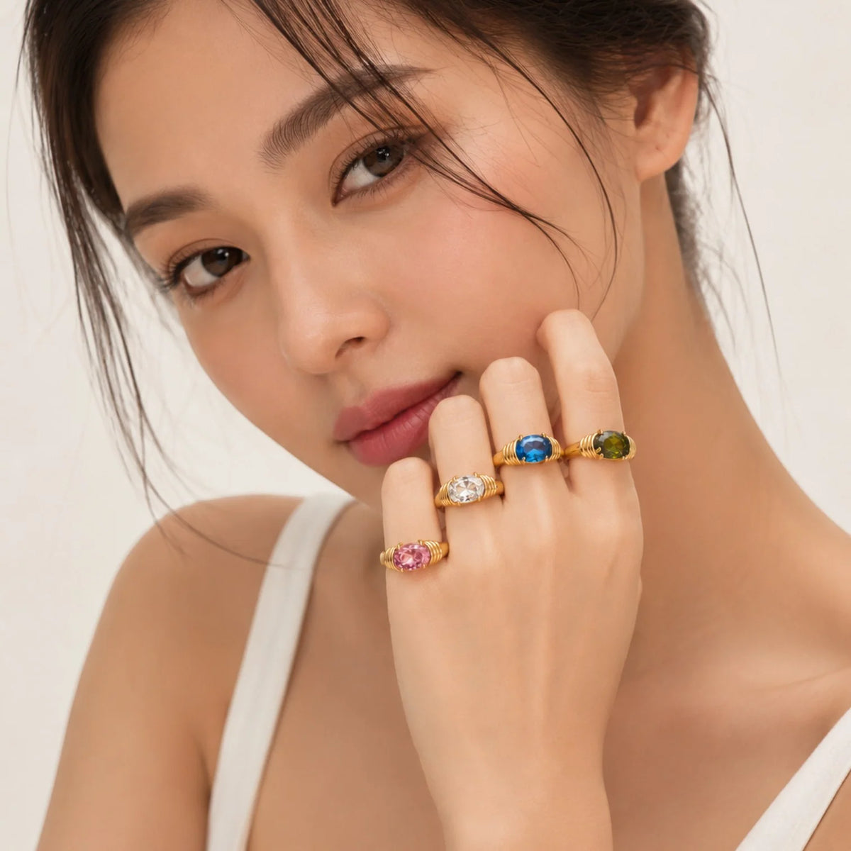 Molly ribbed gold ring with a green oval stone, view 3